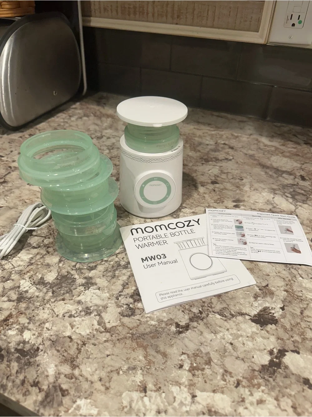 MOMCOZY Portable Baby Bottle Warmer in Mint Green gently used.